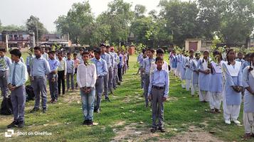स्व. बृजलाल कुशवाहा जी की  याद में विद्यालय परिसर कुलकुम्हारी  बांदा में लगाए गए कदम और अशोक के पांच पौधे