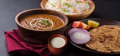 Dal Makhani, Fried Rice, 2 Roti, Salad, Raita