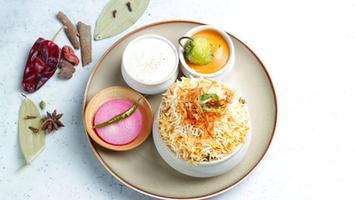 Chicken Biryani, Chicken Korma, Salad and Raita