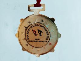 first position medal in open rink skating championship